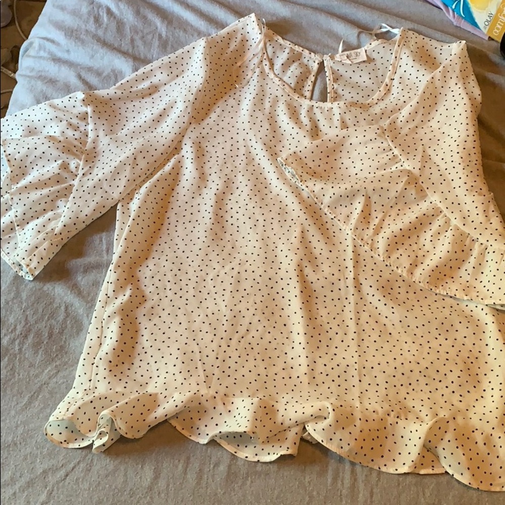 Black and white polka-dot blouse